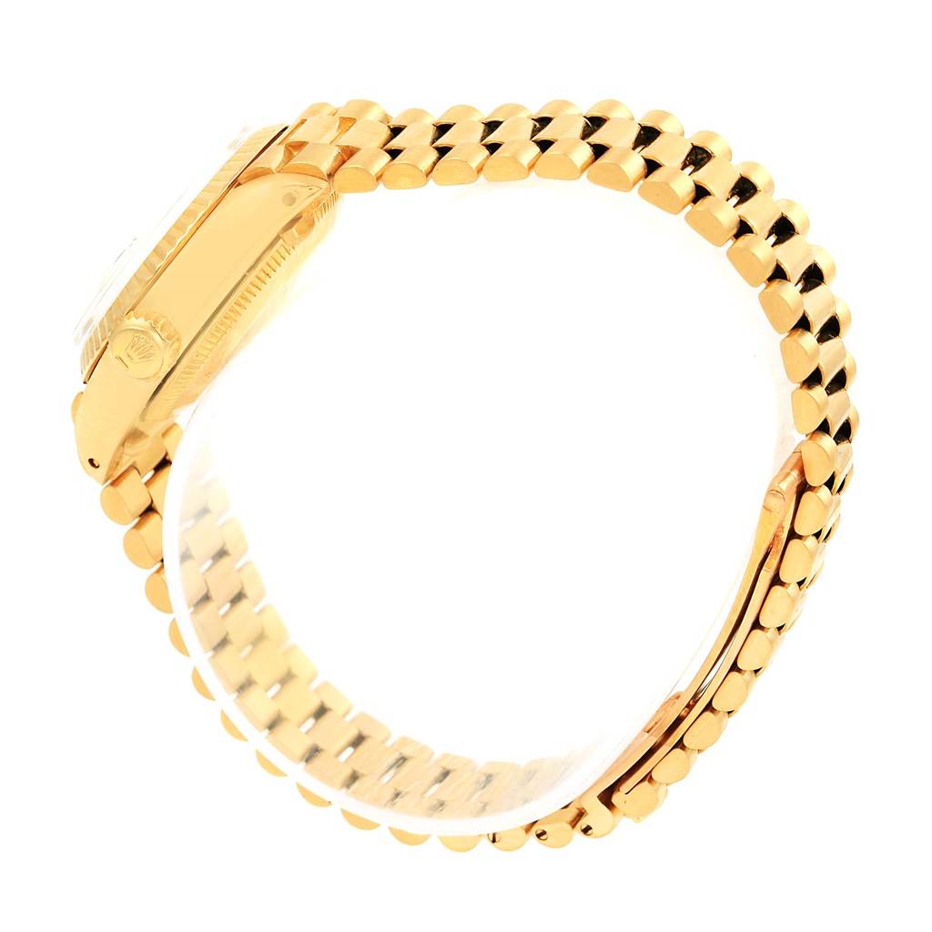 The image shows a side view of the Rolex President 6917 Women's Yellow Gold Champagne Dial 6917 Women's Yellow Gold Champagne Dial model watch, highlighting its gold case and bracelet.