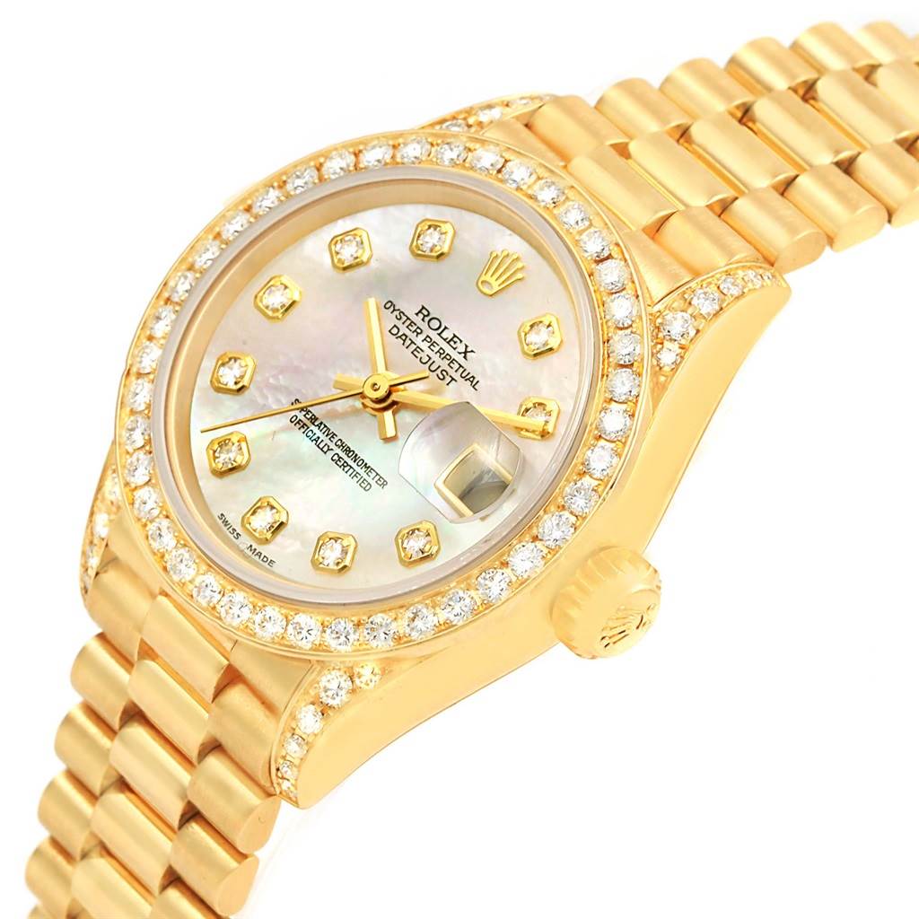 This image shows a Rolex President 79158 Women's Yellow Gold Mother of Pearl Dial 79158 Women's Yellow Gold Mother of Pearl Dial model watch from a top angle, highlighting its bezel, dial, crown, and bracelet.