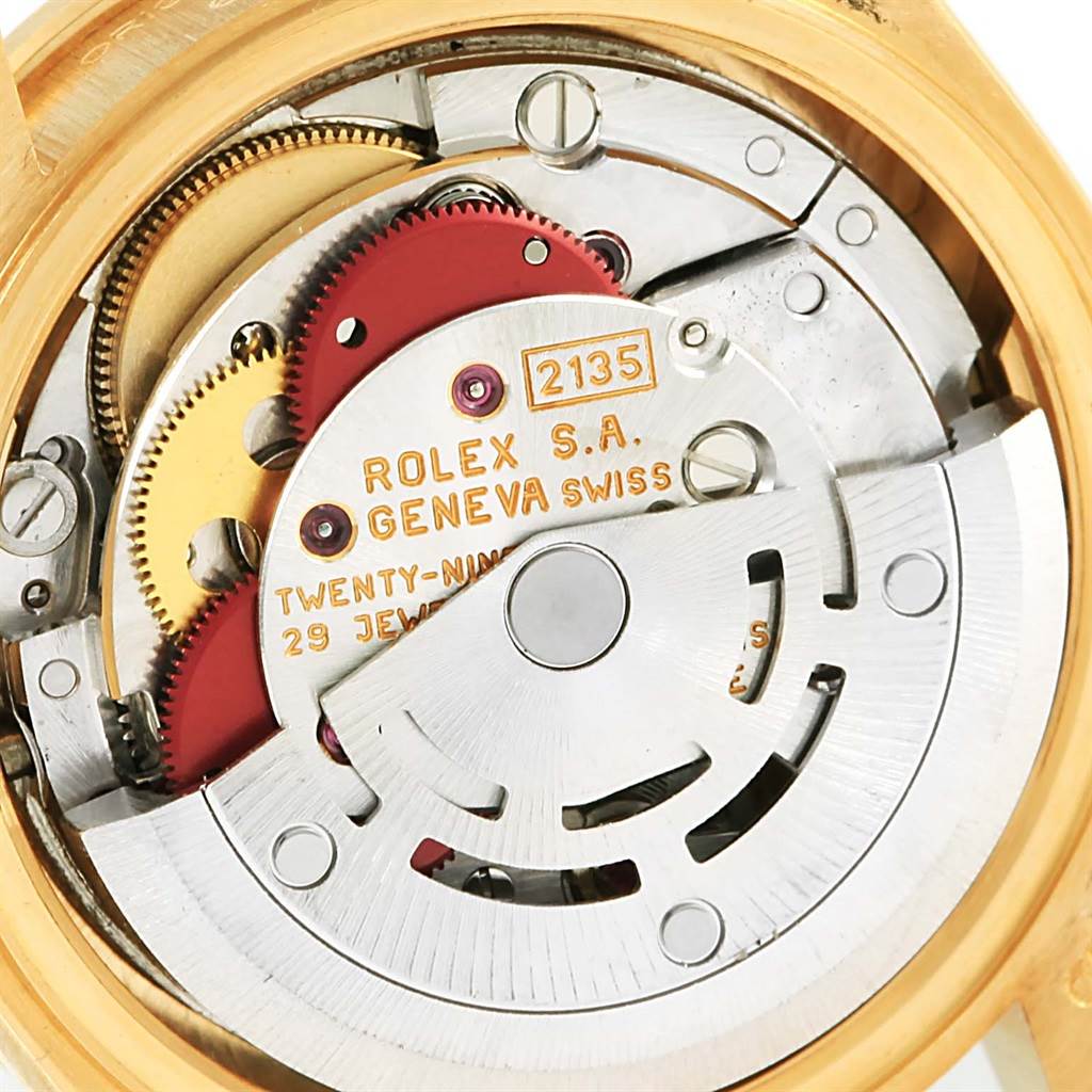 The image shows the internal mechanical parts of a Rolex President 69138 Women's Yellow Gold Champagne Dial 69138 Women's Yellow Gold Champagne Dial model watch from a close-up angle.