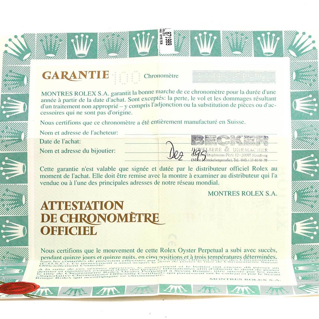 The image shows a Rolex President 69138 Women's Yellow Gold Champagne Dial 69138 Women's Yellow Gold Champagne Dial model warranty card with green decorative borders and official details filled out.