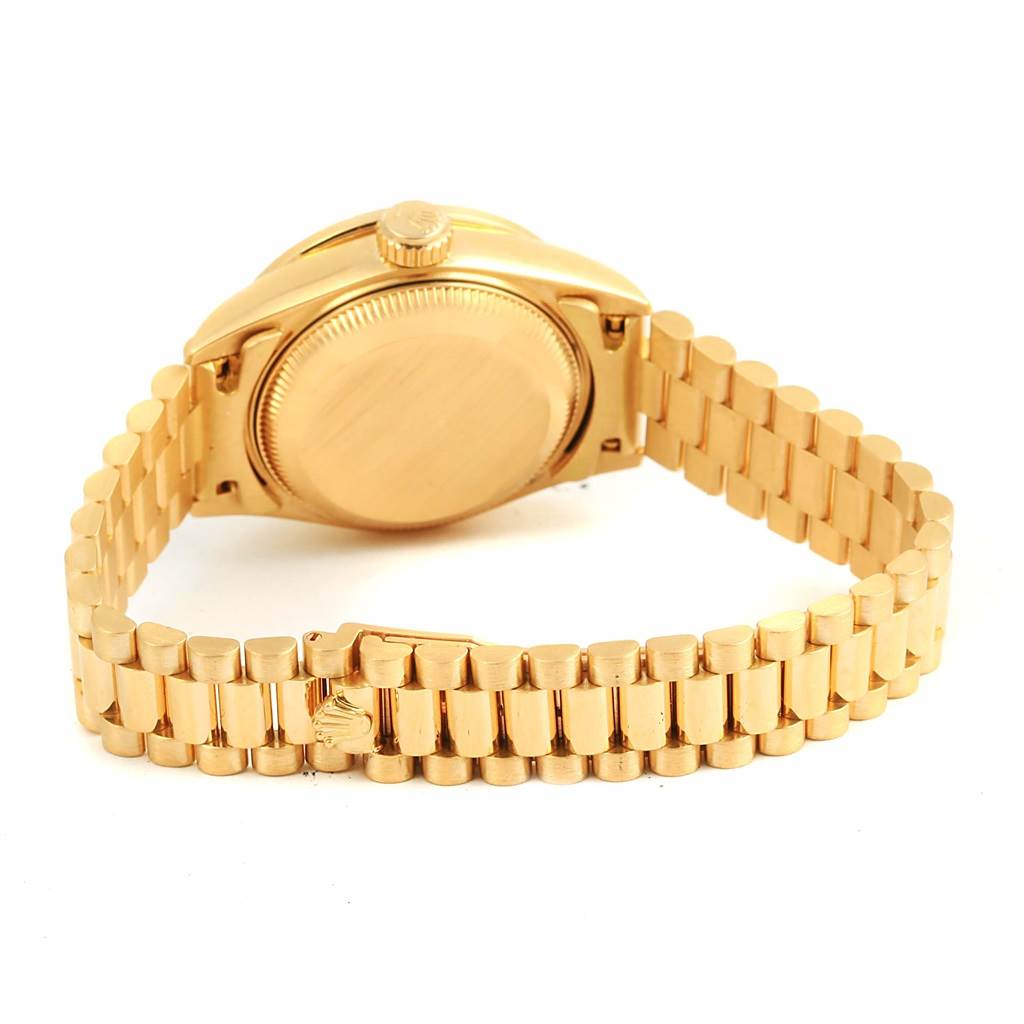 This image shows the back case and bracelet of a Rolex President 69138 Women's Yellow Gold Champagne Dial 69138 Women's Yellow Gold Champagne Dial model watch from a rear angle.