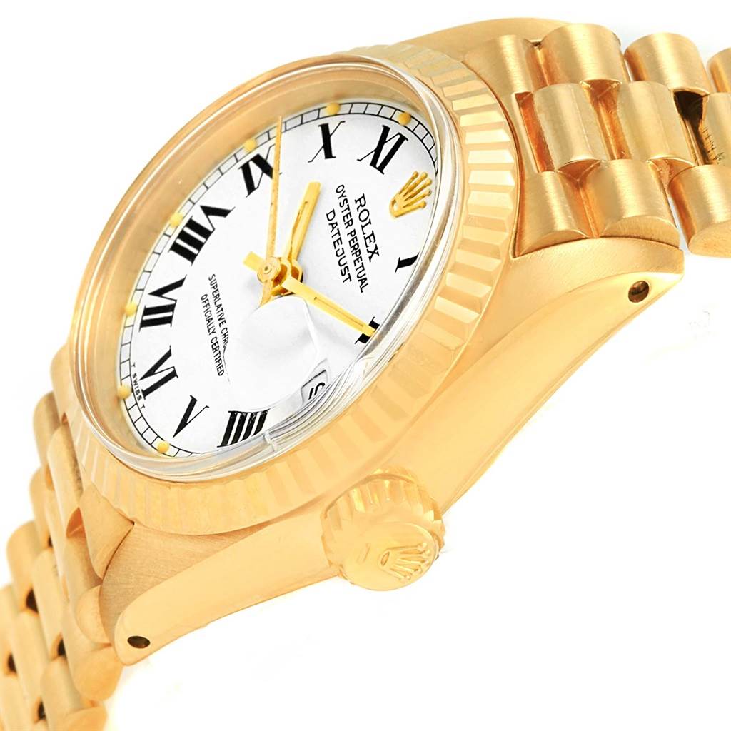 This image shows a close-up angled view of the Rolex President 6917 Women's Yellow Gold White Dial 6917 Women's Yellow Gold White Dial watch, highlighting the dial, bezel, crown, and bracelet.