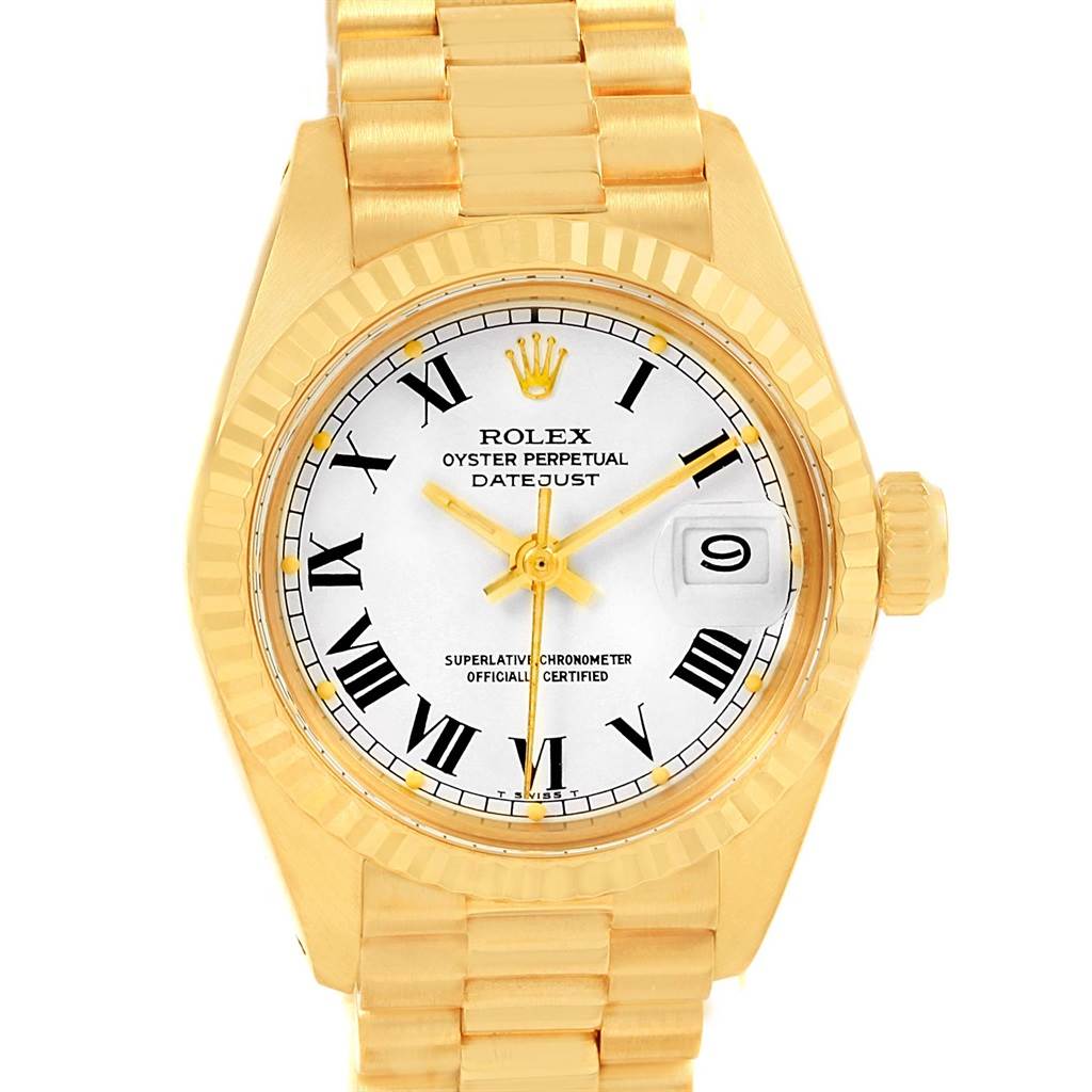 This image shows a Rolex President 6917 Women's Yellow Gold White Dial 6917 Women's Yellow Gold White Dial model watch from a front angle, highlighting the gold band, bezel, and white dial with Roman numerals.