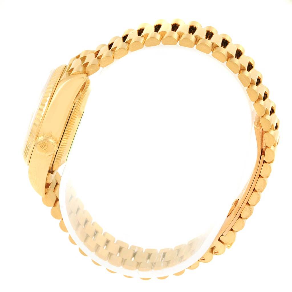 This image shows a side angle of the Rolex President 69178 Women's Yellow Gold White Dial 69178 Women's Yellow Gold White Dial model, highlighting its gold case and bracelet.