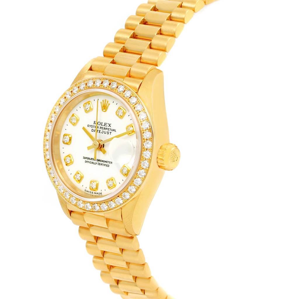 The image shows a Rolex President 69138 Women's Yellow Gold White Dial 69138 Women's Yellow Gold White Dial model from a slight side angle, highlighting the bezel, dial, crown, and bracelet.