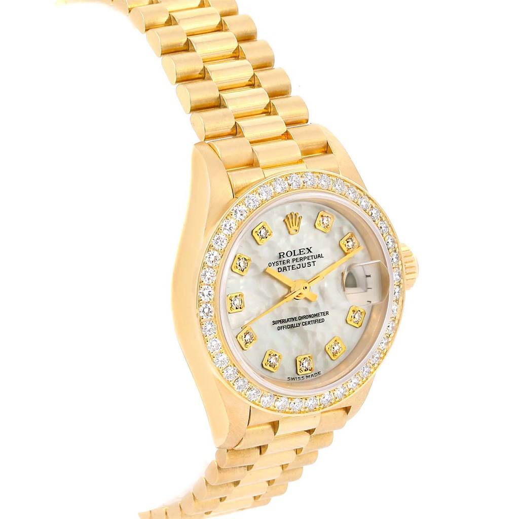 This image shows a Rolex President 79138 Women's Yellow Gold Mother of Pearl Dial 79138 Women's Yellow Gold Mother of Pearl Dial model watch angled slightly from above, displaying the dial, bezel, and part of the bracelet.