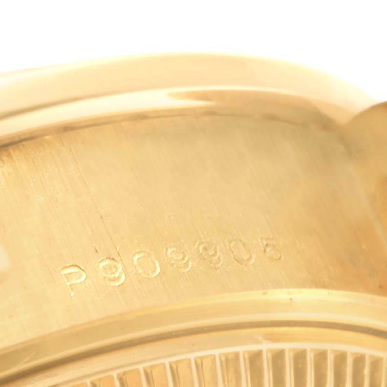 This image shows a close-up of the case back, including part of the serial number, on a Rolex President 79138 Women's Yellow Gold Mother of Pearl Dial 79138 Women's Yellow Gold Mother of Pearl Dial model watch.