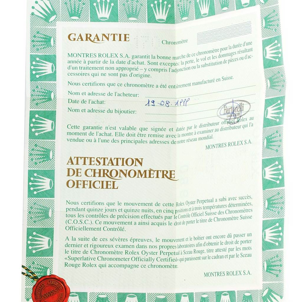 The image shows the warranty certificate for the Rolex President 69178 Women's Yellow Gold Blue Dial 69178 Women's Yellow Gold Blue Dial model, detailing purchase and authenticity information.