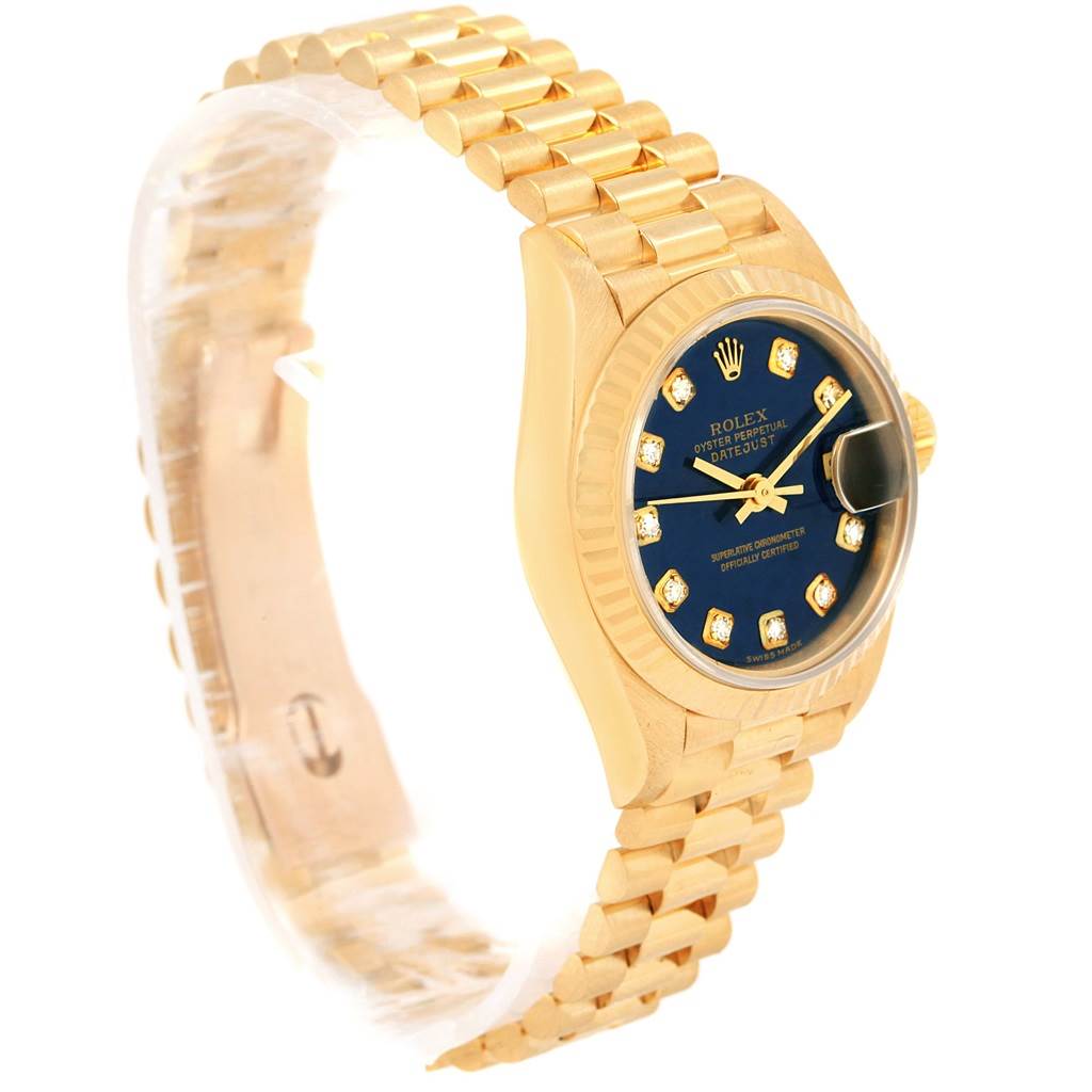 The image shows a Rolex President 69178 Women's Yellow Gold Blue Dial 69178 Women's Yellow Gold Blue Dial model watch at a slight angle, displaying the gold bracelet, blue dial, diamond hour markers, and date window.