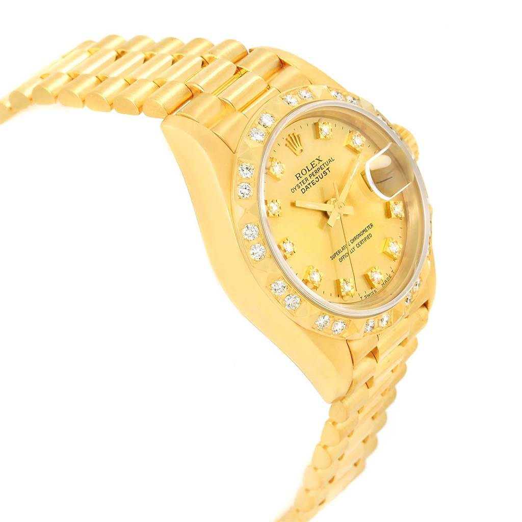 This image shows the Rolex President 69258 Women's Yellow Gold Champagne Dial 69258 Women's Yellow Gold Champagne Dial model watch, displaying its gold bezel, bracelet, and face from a slanted side angle.