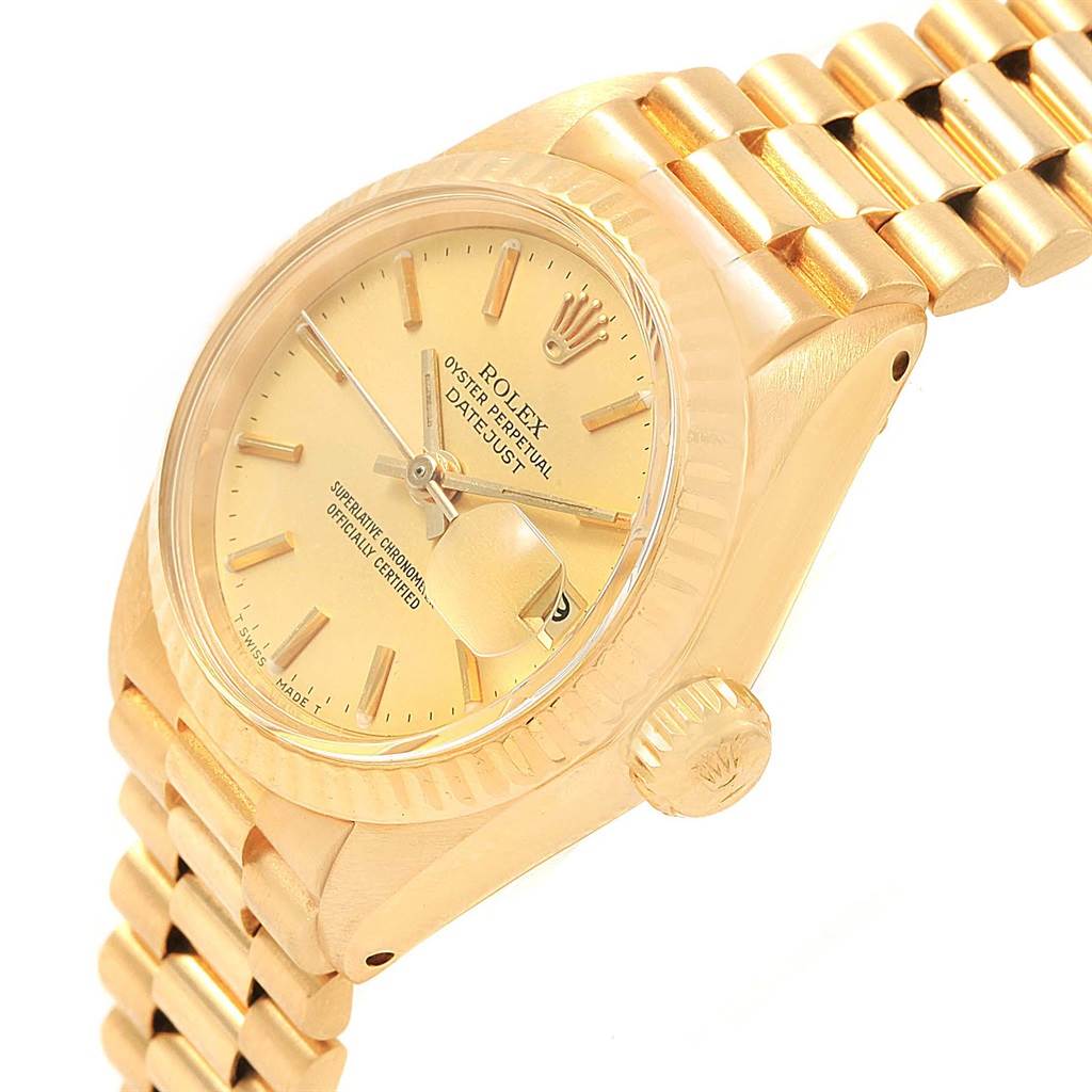 The image shows a Rolex President 6917 Women's Yellow Gold Champagne Dial 6917 Women's Yellow Gold Champagne Dial model watch from a side angle, highlighting the dial, bezel, crown, and part of the bracelet.