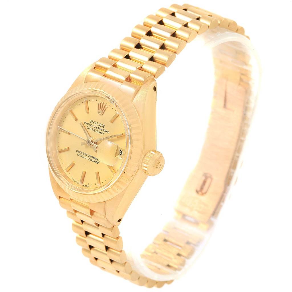 This is an image of a Rolex President 6917 Women's Yellow Gold Champagne Dial 6917 Women's Yellow Gold Champagne Dial model watch, showing an angled side view displaying the face, bezel, crown, and bracelet.