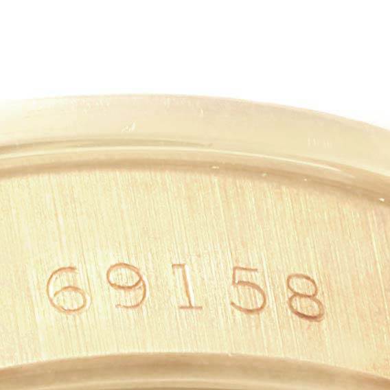 The image shows the engraved model number "69158" on the case back of a Rolex President 69158 Women
s Yellow Gold Champagne Dial 69158 Women
s Yellow Gold Champagne Dial watch.
