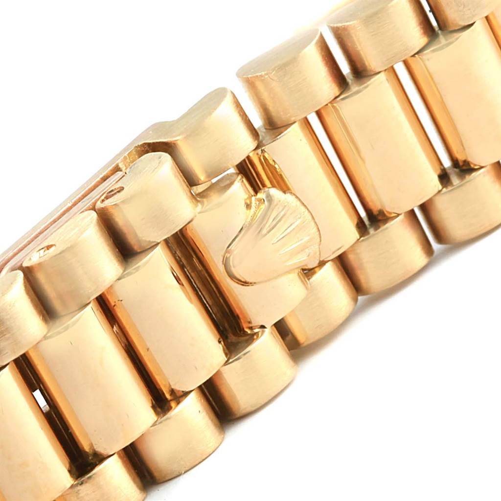 This close-up image shows the bracelet links and clasp of a Rolex President 69088 Women's Yellow Gold Blue Dial 69088 Women's Yellow Gold Blue Dial model watch.