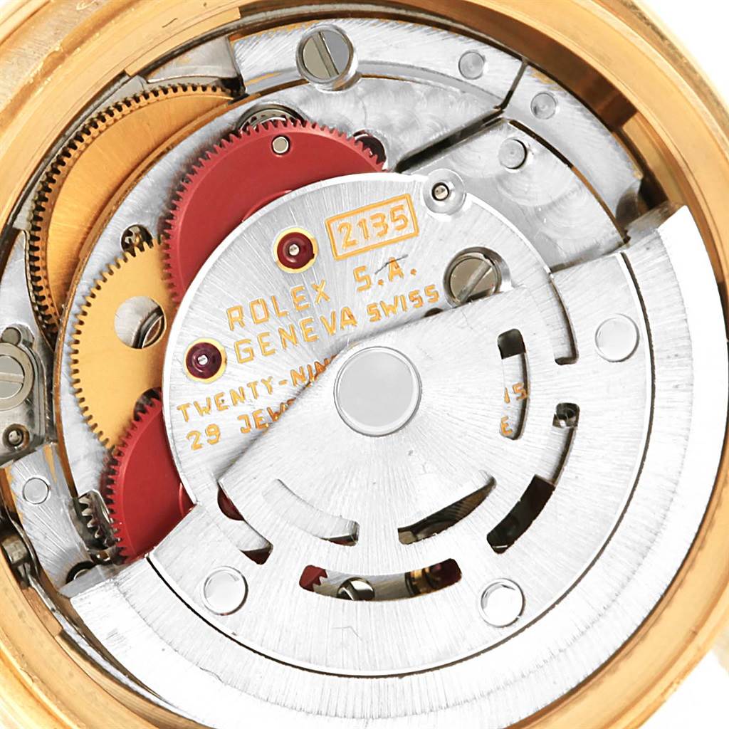 This close-up image shows the internal mechanism and movement parts of the Rolex President 69088 Women's Yellow Gold Blue Dial 69088 Women's Yellow Gold Blue Dial model watch.