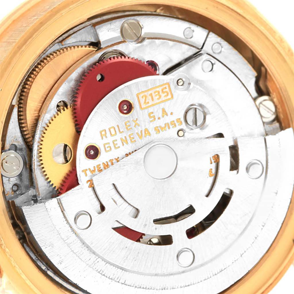 The image shows a close-up view of the internal mechanical movement of a Rolex President 69038 Women's Yellow Gold Blue Dial 69038 Women's Yellow Gold Blue Dial model watch.