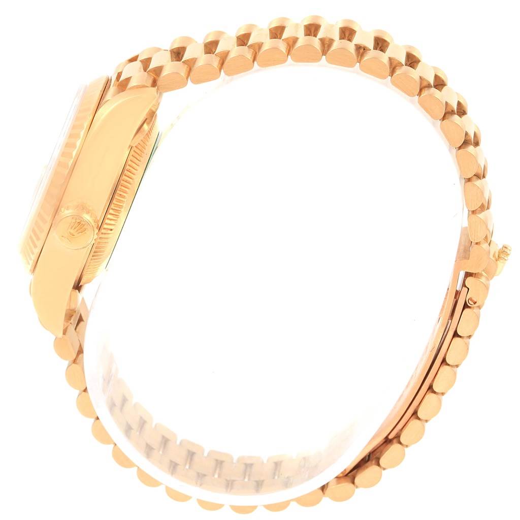 The image shows a side view of the Rolex President 69178 Women's Yellow Gold Mother of Pearl Dial 69178 Women's Yellow Gold Mother of Pearl Dial model watch, including the crown and the bracelet.