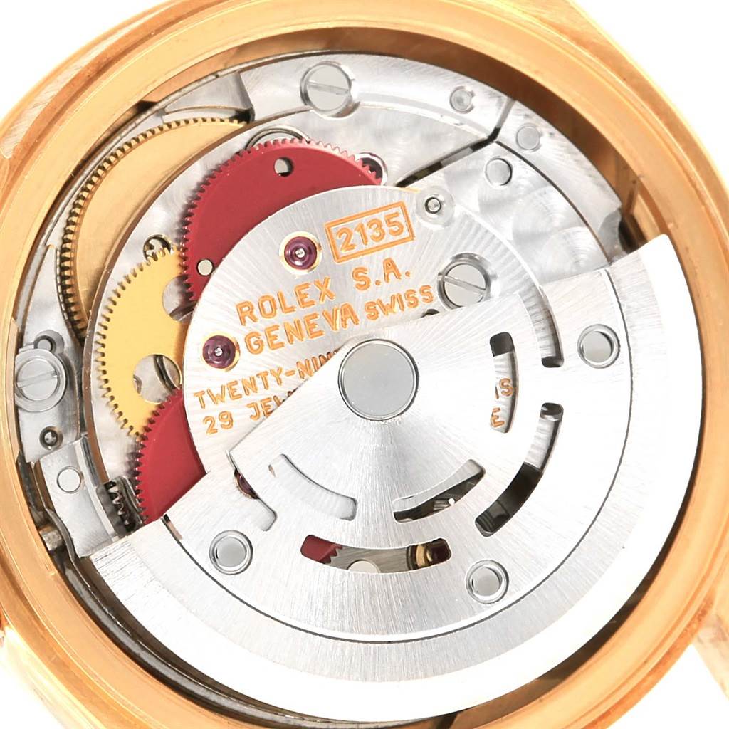 This shows the internal mechanical movement of a Rolex President 69178 Women's Yellow Gold Mother of Pearl Dial 69178 Women's Yellow Gold Mother of Pearl Dial model watch, featuring gears and intricate details.