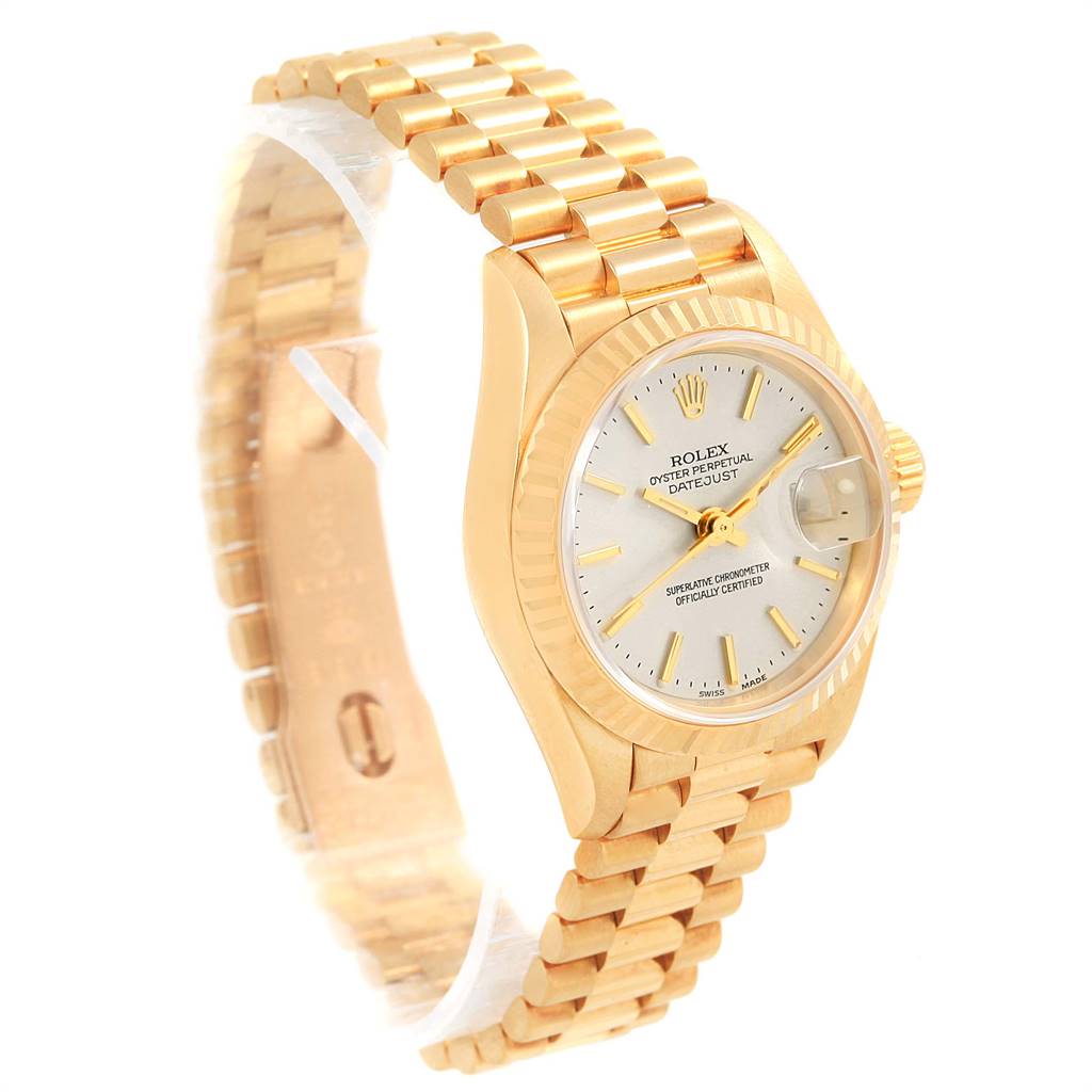 The image shows a Rolex President 79178 Women's Yellow Gold Silver Dial 79178 Women's Yellow Gold Silver Dial model watch at a front-side angle, displaying its gold bracelet, dial, and fluted bezel.