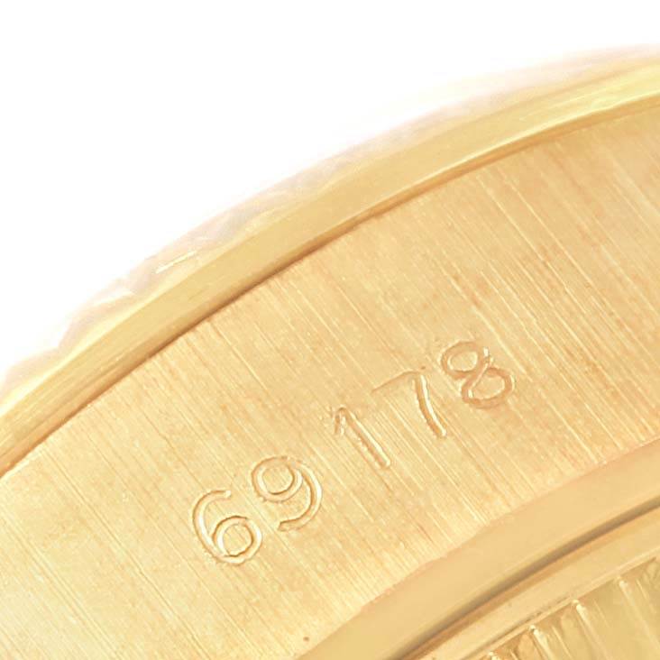 The image shows a close-up of the side of the Rolex President 69178 Women's Yellow Gold Champagne Dial 69178 Women's Yellow Gold Champagne Dial model, highlighting the engraved model number "69178."