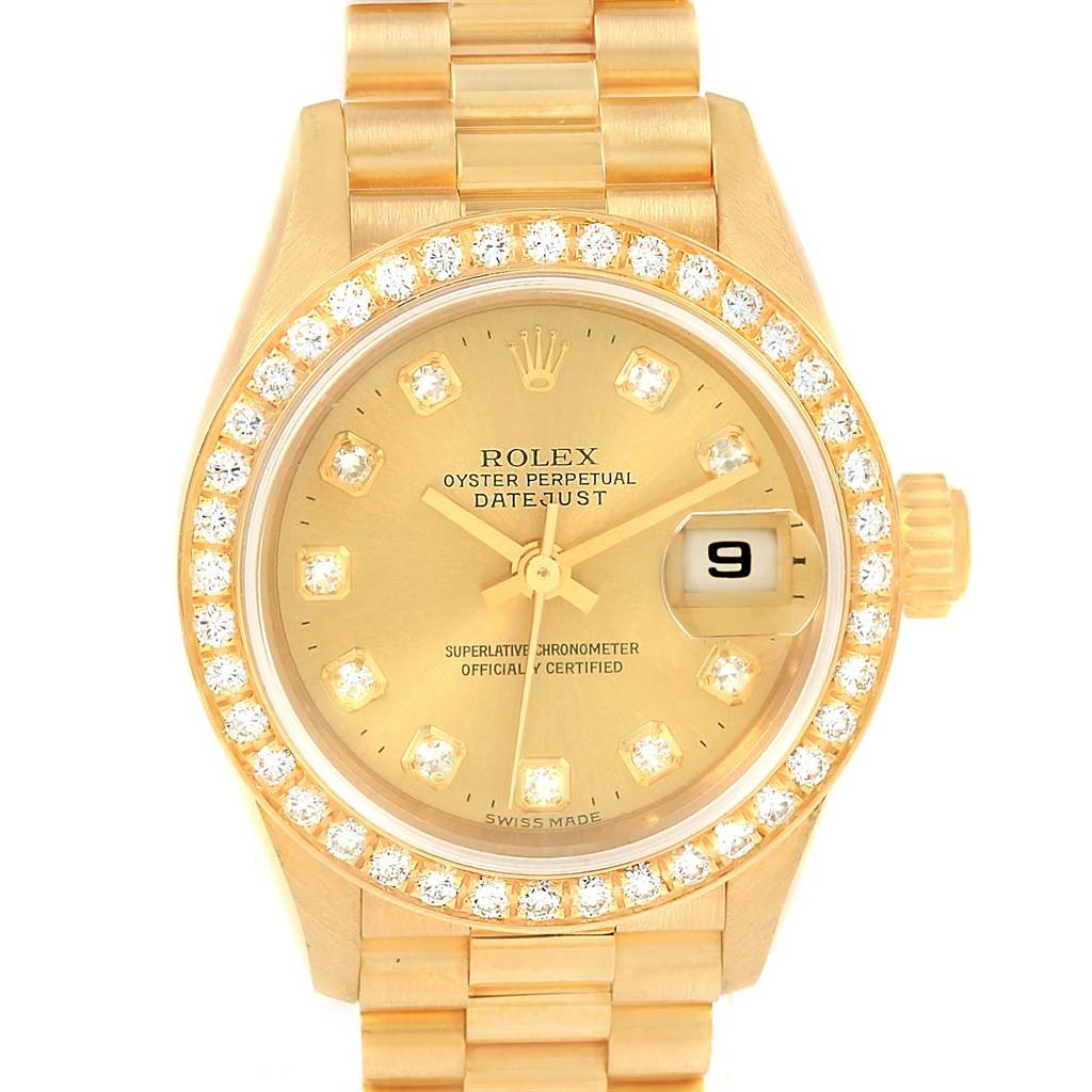 This image shows a frontal view of a Rolex President 79138 Women's Yellow Gold Champagne Dial 79138 Women's Yellow Gold Champagne Dial model watch, highlighting its gold bracelet, diamond bezel, and date function.