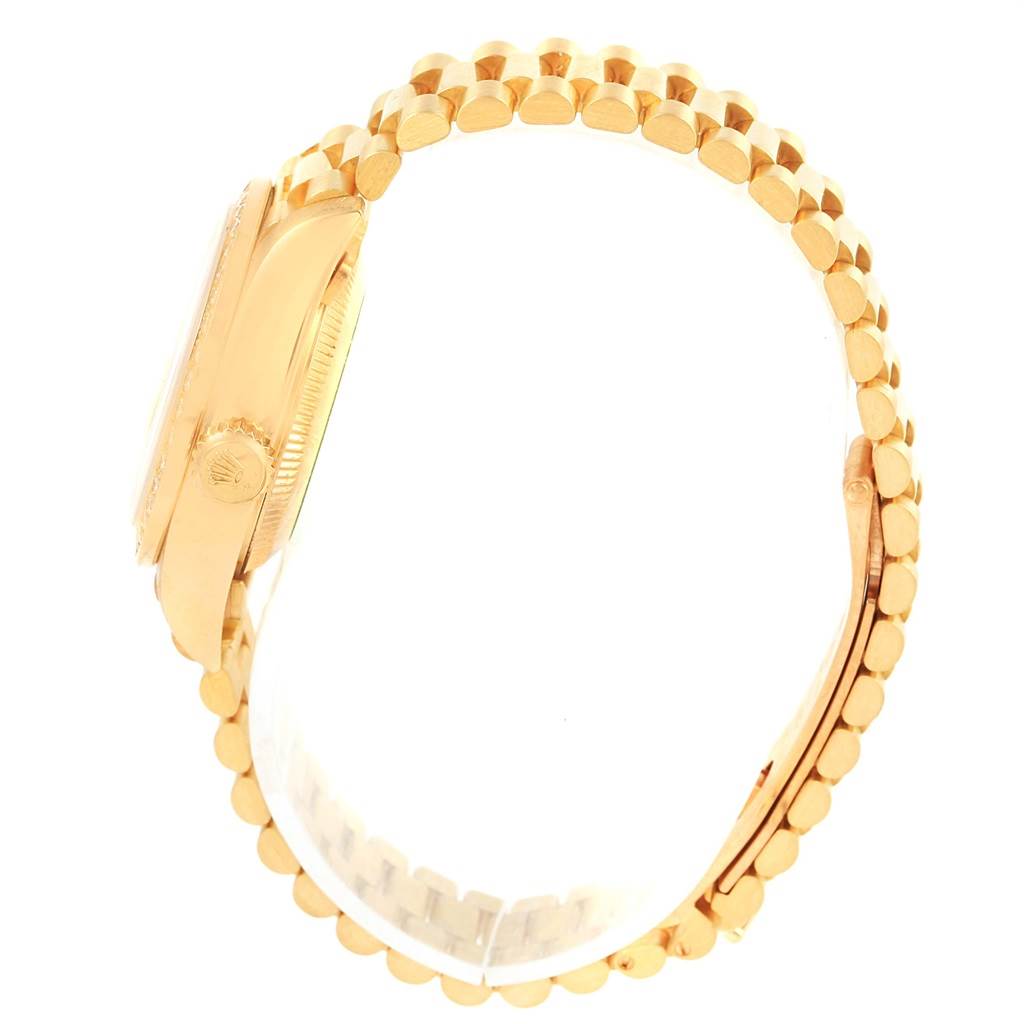 The image shows a side view of a Rolex President 79138 Women's Yellow Gold Champagne Dial 79138 Women's Yellow Gold Champagne Dial model watch, highlighting its case, crown, and bracelet.