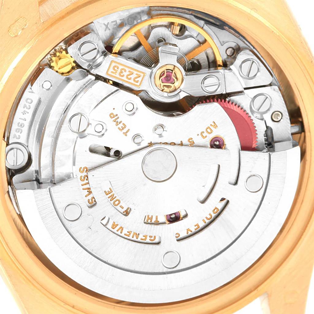 The image shows the internal mechanism of a Rolex President 79178 Women's Yellow Gold White Dial 79178 Women's Yellow Gold White Dial model watch, highlighting its movement and intricate parts from the back.