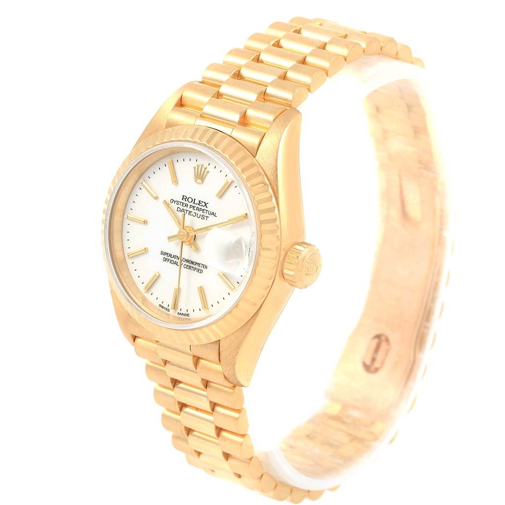 The image shows a Rolex President 79178 Women's Yellow Gold White Dial 79178 Women's Yellow Gold White Dial watch at a slight angle, highlighting its gold bracelet, crown, and white dial.