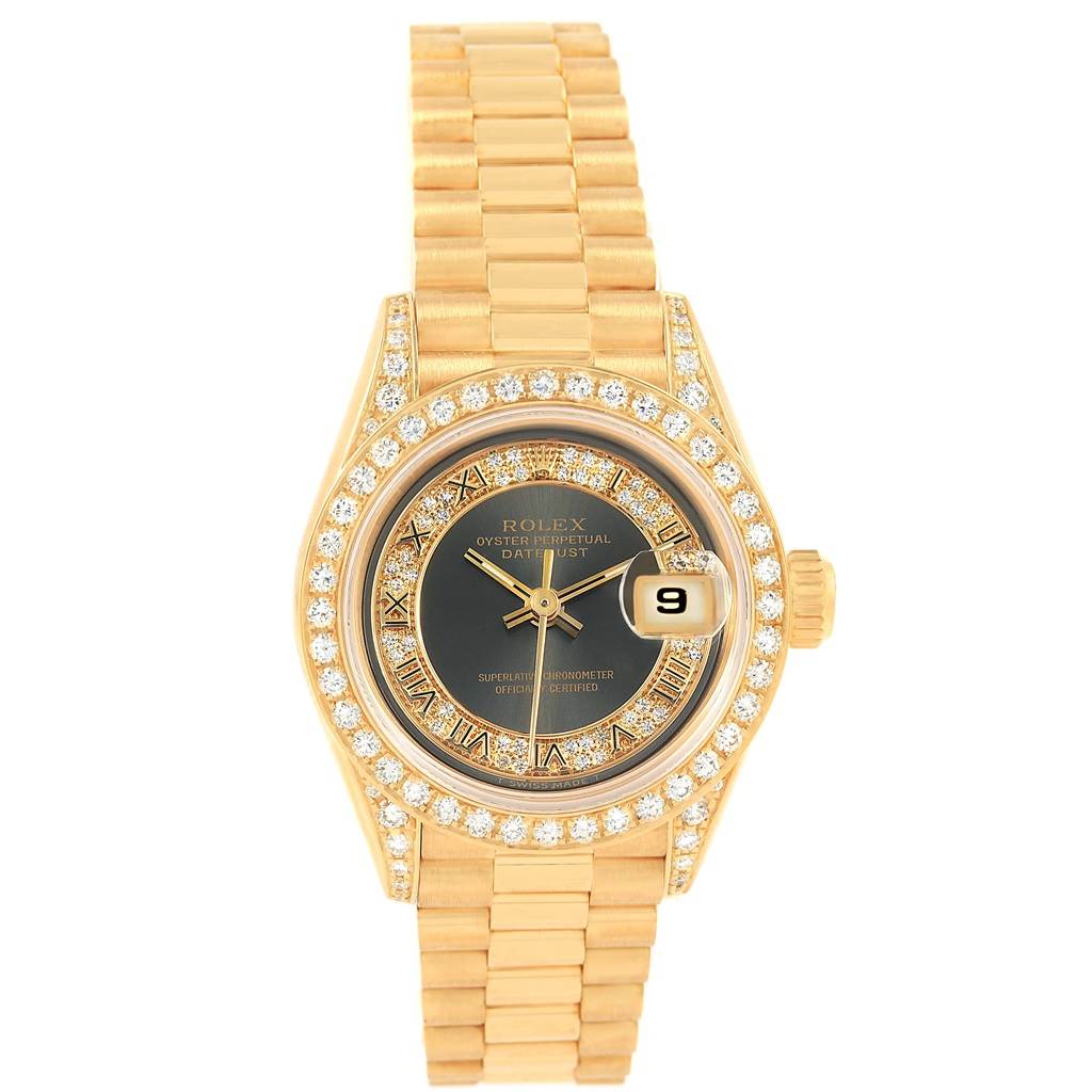 The image shows a frontal view of a Rolex President 69158 Women's Yellow Gold Grey Dial 69158 Women's Yellow Gold Grey Dial model watch with a gold band and diamond-encrusted bezel.