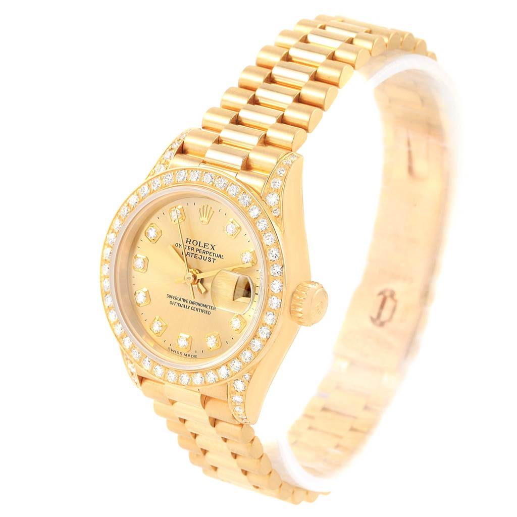 This image shows a Rolex President 69158 Women's Yellow Gold Champagne Dial 69158 Women's Yellow Gold Champagne Dial model watch, angled to highlight its gold bracelet, diamond-set bezel, and face.