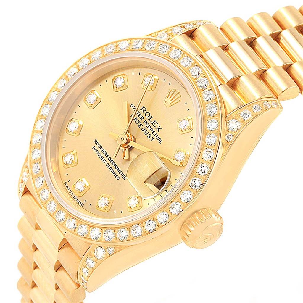 This image shows the face, bezel, crown, and bracelet of a Rolex President 69158 Women's Yellow Gold Champagne Dial 69158 Women's Yellow Gold Champagne Dial model watch at an angled view.