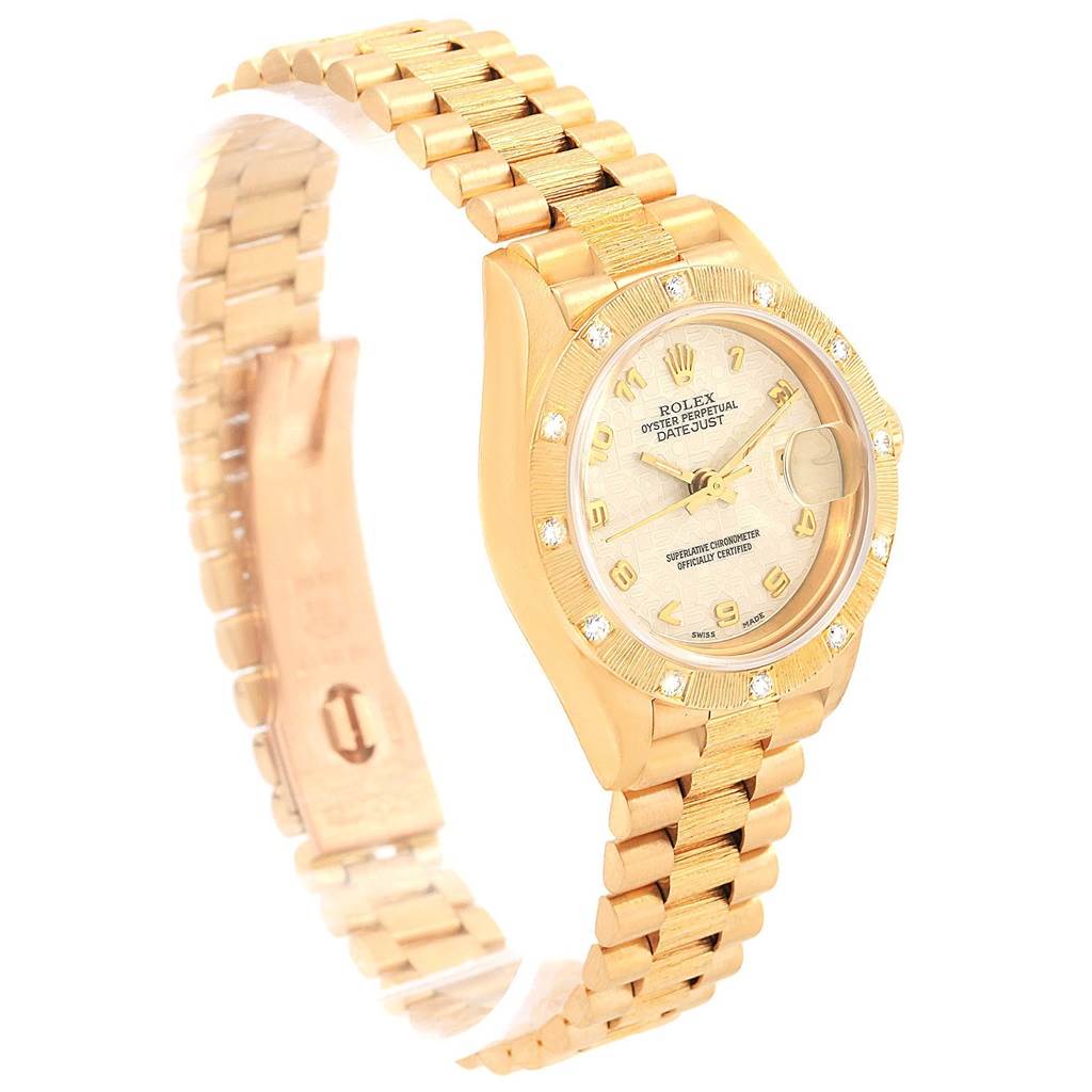 The image shows a Rolex President 69288 Women's Yellow Gold Beige Dial 69288 Women's Yellow Gold Beige Dial model watch from an angled side view, focusing on its gold bracelet and diamond-accented face.