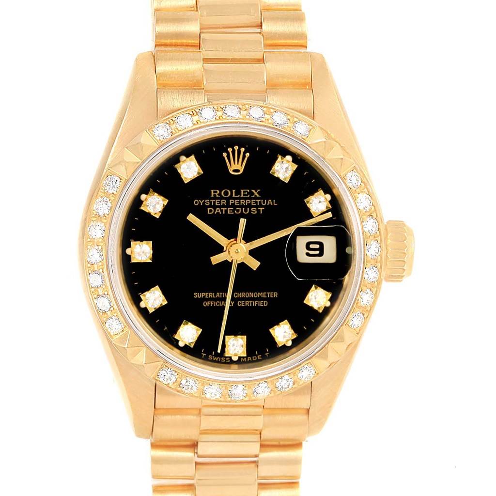 The image shows a President model Rolex watch with a gold bracelet, black dial, date display, and diamond bezel.