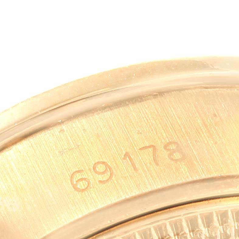 This image shows a close-up of the case back with model number 69178 of a Rolex President 69178 Women
s Yellow Gold Champagne Dial 69178 Women
s Yellow Gold Champagne Dial watch.