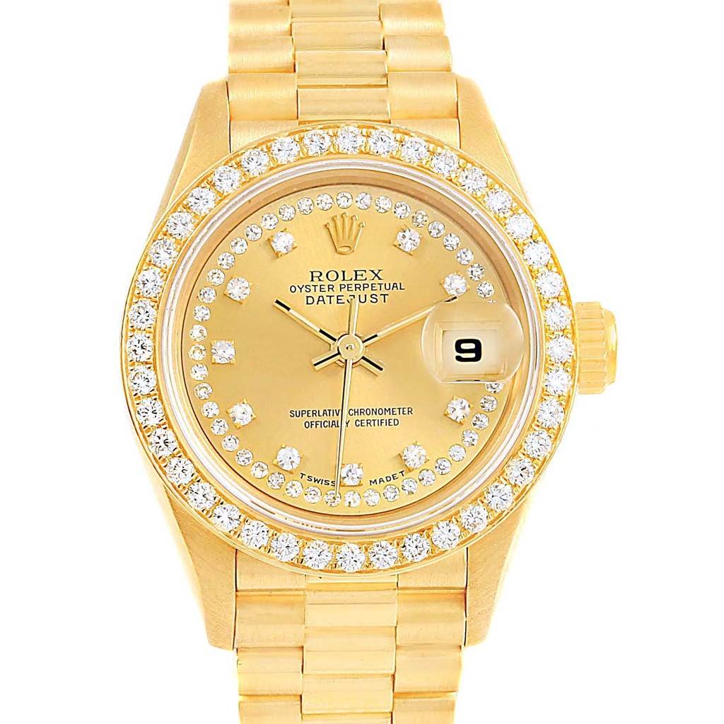 The image shows a front view of the Rolex President 69178 Women
s Yellow Gold Champagne Dial 69178 Women
s Yellow Gold Champagne Dial Datejust watch, highlighting its gold finish and diamond-encrusted bezel.
