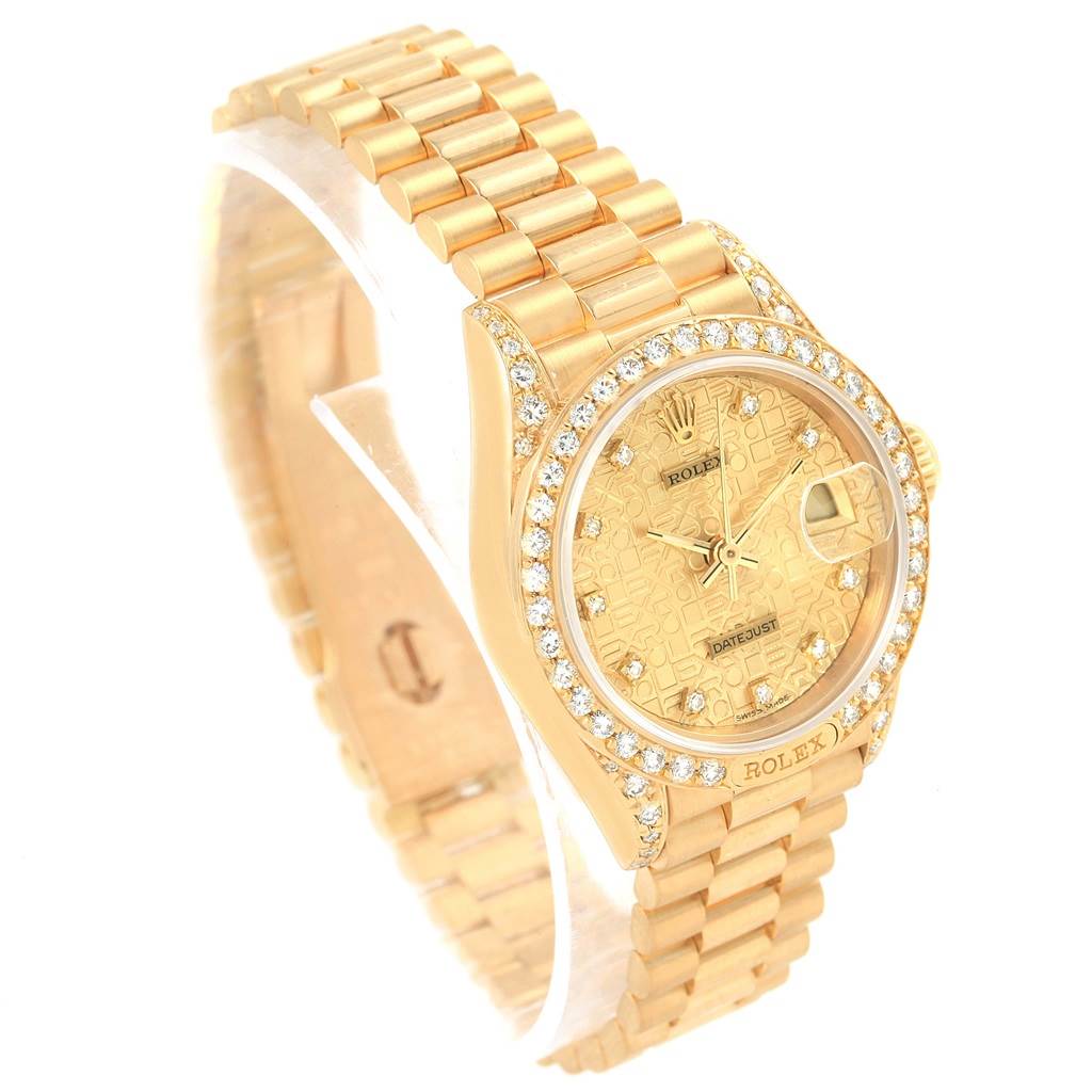 This image shows a Rolex President 69158 Women's Yellow Gold Champagne Dial 69158 Women's Yellow Gold Champagne Dial model watch at an angle highlighting its face, bezel, and bracelet.