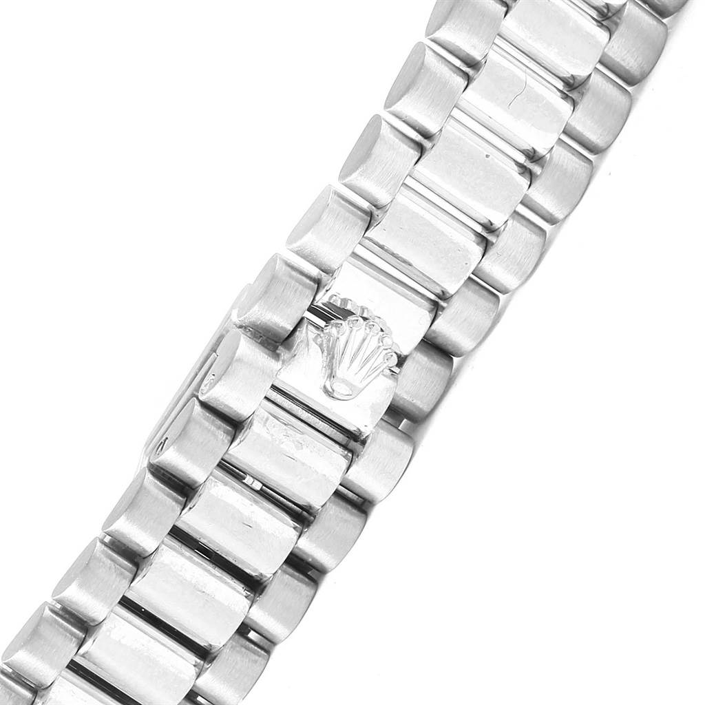This image shows a close-up view of the bracelet of the Rolex President 79159 Women's White Gold Mother of Pearl Dial 79159 Women's White Gold Mother of Pearl Dial model watch, highlighting the clasp with the Rolex logo.