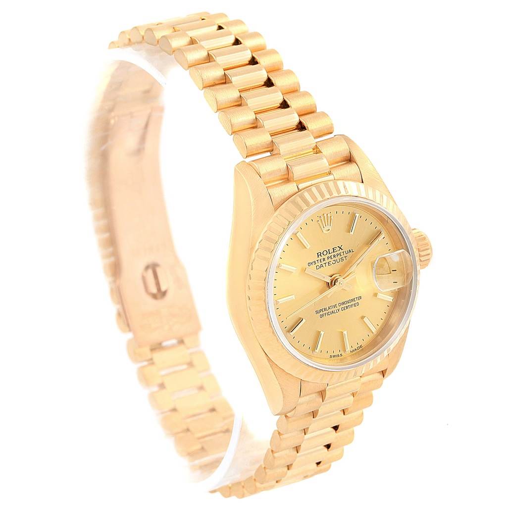 This image shows a side angle of a Rolex President 69178 Women's Yellow Gold Champagne Dial 69178 Women's Yellow Gold Champagne Dial model watch, featuring its gold dial, fluted bezel, and President bracelet.