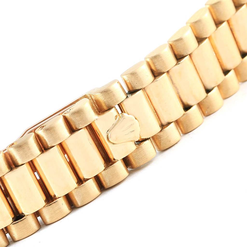 This image depicts a close-up view of the gold bracelet with a clasp of the Rolex President 69198 Women
s Yellow Gold Champagne Dial 69198 Women
s Yellow Gold Champagne Dial model watch.