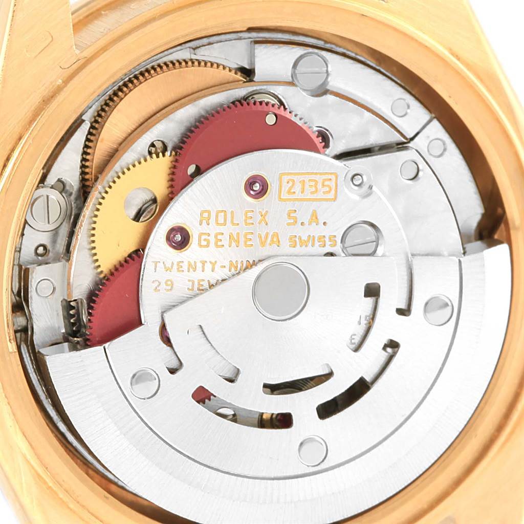 This image shows the inner mechanics and movement of the Rolex President 69198 Women
s Yellow Gold Champagne Dial 69198 Women
s Yellow Gold Champagne Dial model from the back angle.