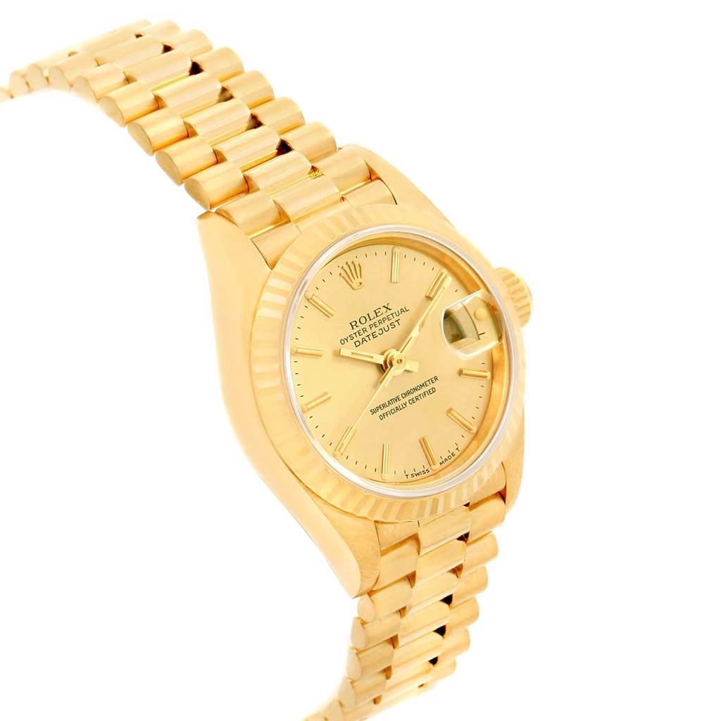The image shows a close-up angle of a Rolex President 69178 Women
s Yellow Gold Champagne Dial 69178 Women
s Yellow Gold Champagne Dial model, highlighting the gold band, case, and dial with date display.