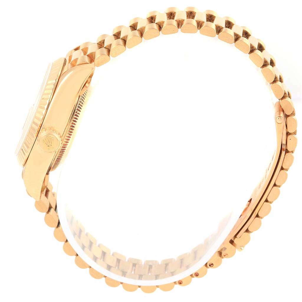 The image shows a side view of a Rolex President 69178 Women
s Yellow Gold Champagne Dial 69178 Women
s Yellow Gold Champagne Dial model watch, focusing on the case, bezel, crown, and bracelet.