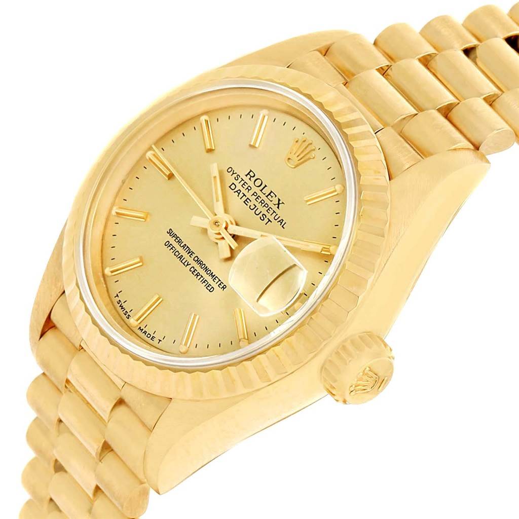 The image shows a Rolex President 69178 Women
s Yellow Gold Champagne Dial 69178 Women
s Yellow Gold Champagne Dial model watch from an oblique angle, highlighting the dial, crown, and bracelet.