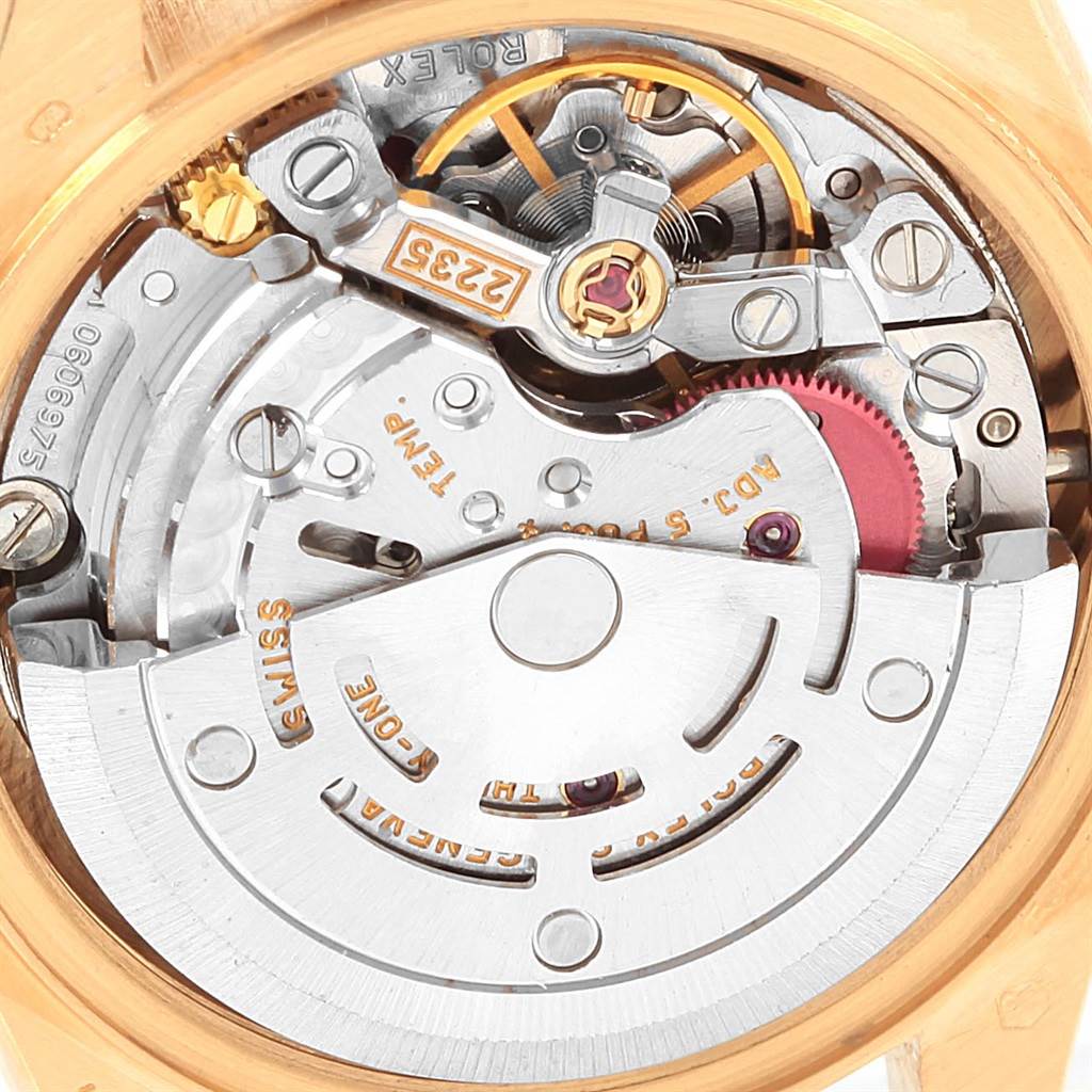The image shows a close-up view of the internal movement mechanism of a Rolex President 79138 Women
s Yellow Gold Champagne Dial 79138 Women
s Yellow Gold Champagne Dial model watch.