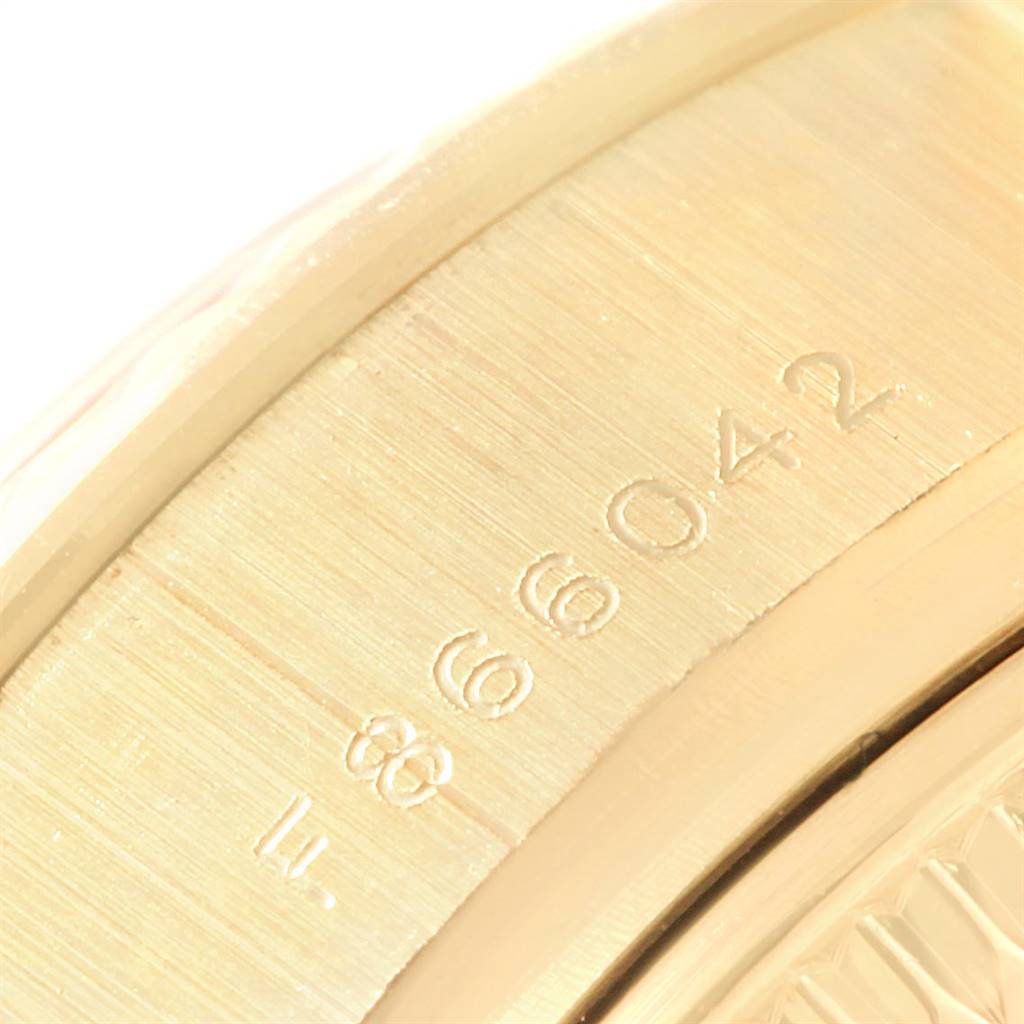 The image shows a close-up of the engraved numbers on the band of a Rolex President 179178 Women's Yellow Gold Black Dial 179178 Women's Yellow Gold Black Dial model watch.