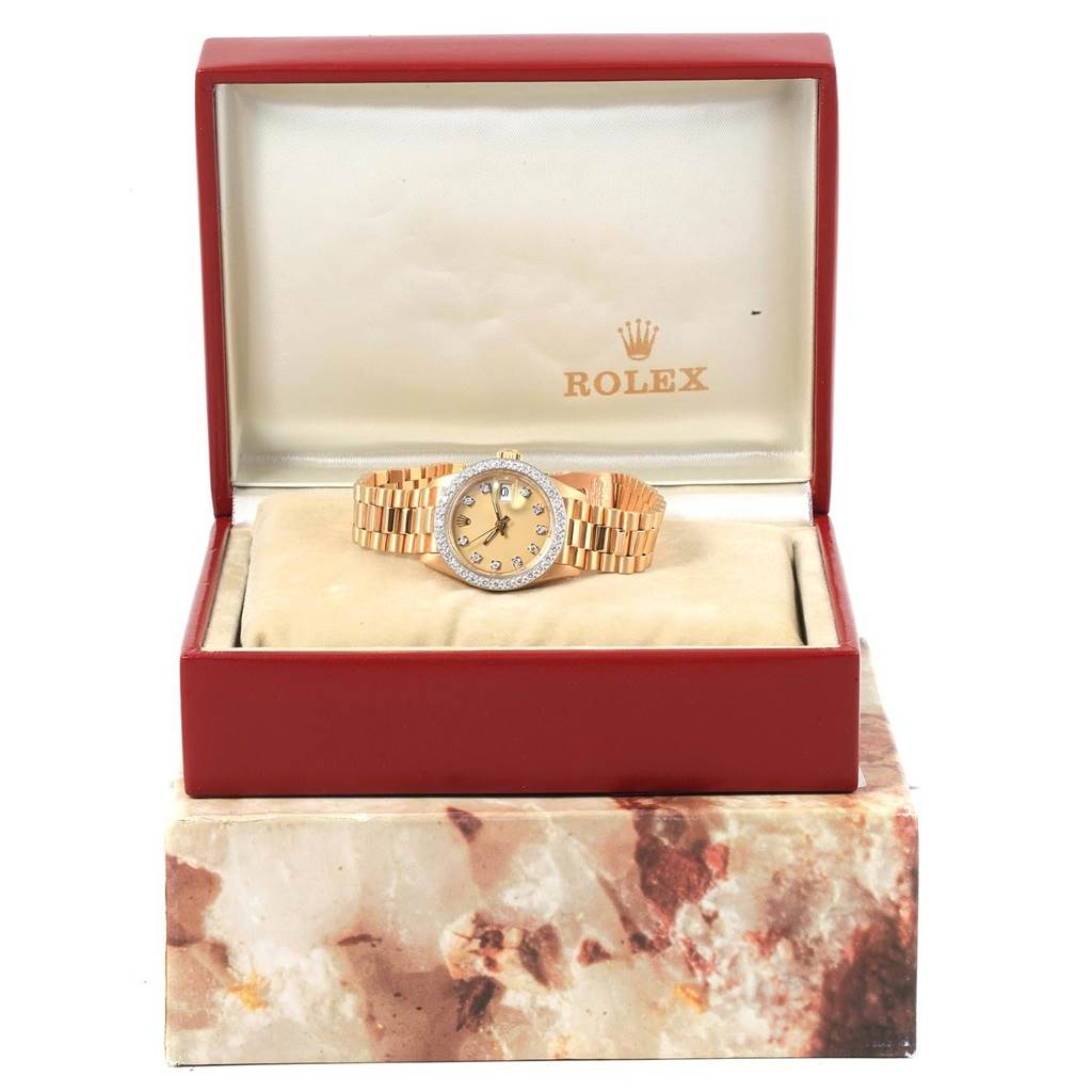 The Rolex President 6917 Women
s Yellow Gold Champagne Dial 6917 Women
s Yellow Gold Champagne Dial watch is shown from the front, displayed in an open, branded box with a clear view of the face and bracelet.