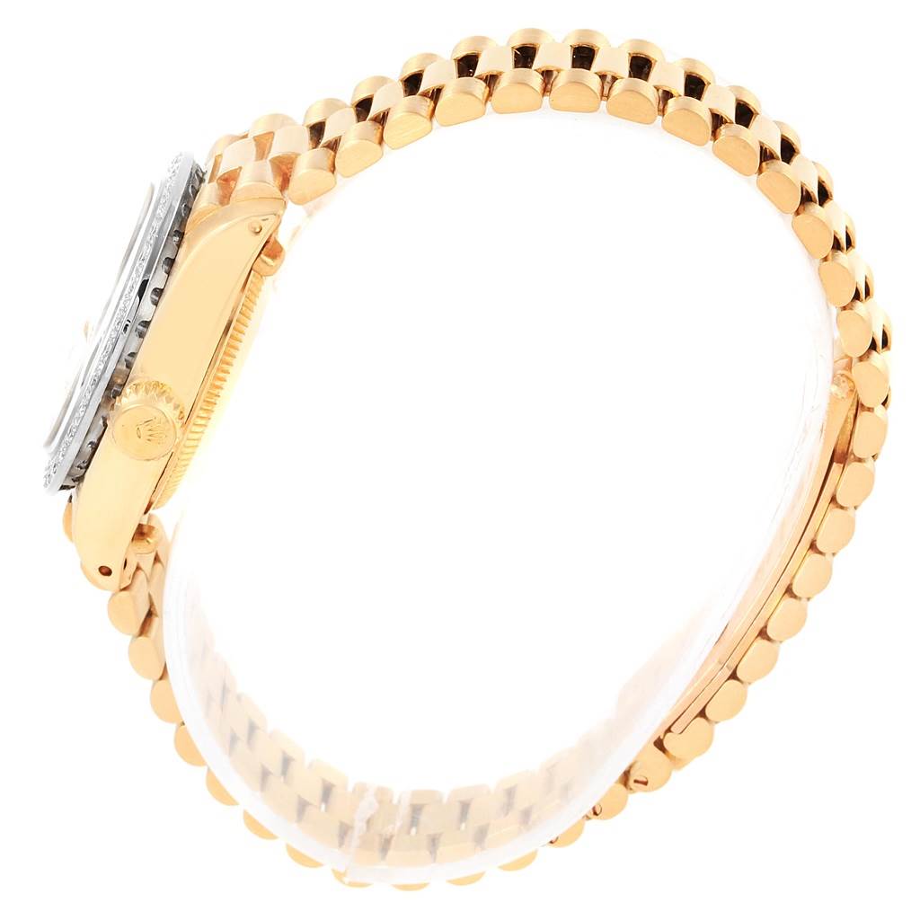The image shows a side view of a Rolex President 6917 Women
s Yellow Gold Champagne Dial 6917 Women
s Yellow Gold Champagne Dial model watch, highlighting its gold bracelet and side case.