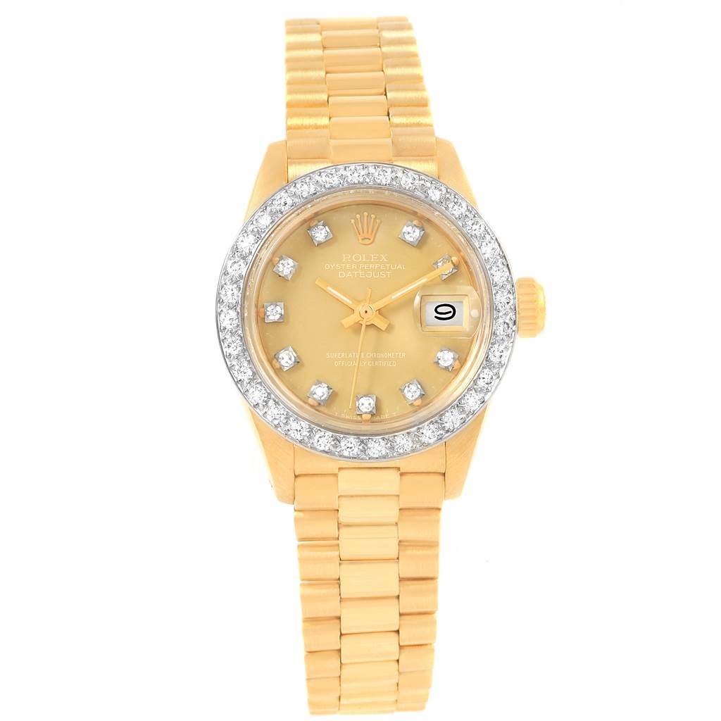 This image shows a frontal view of a Rolex President 6917 Women
s Yellow Gold Champagne Dial 6917 Women
s Yellow Gold Champagne Dial model watch, featuring a gold bracelet, diamond bezel, and gold dial.