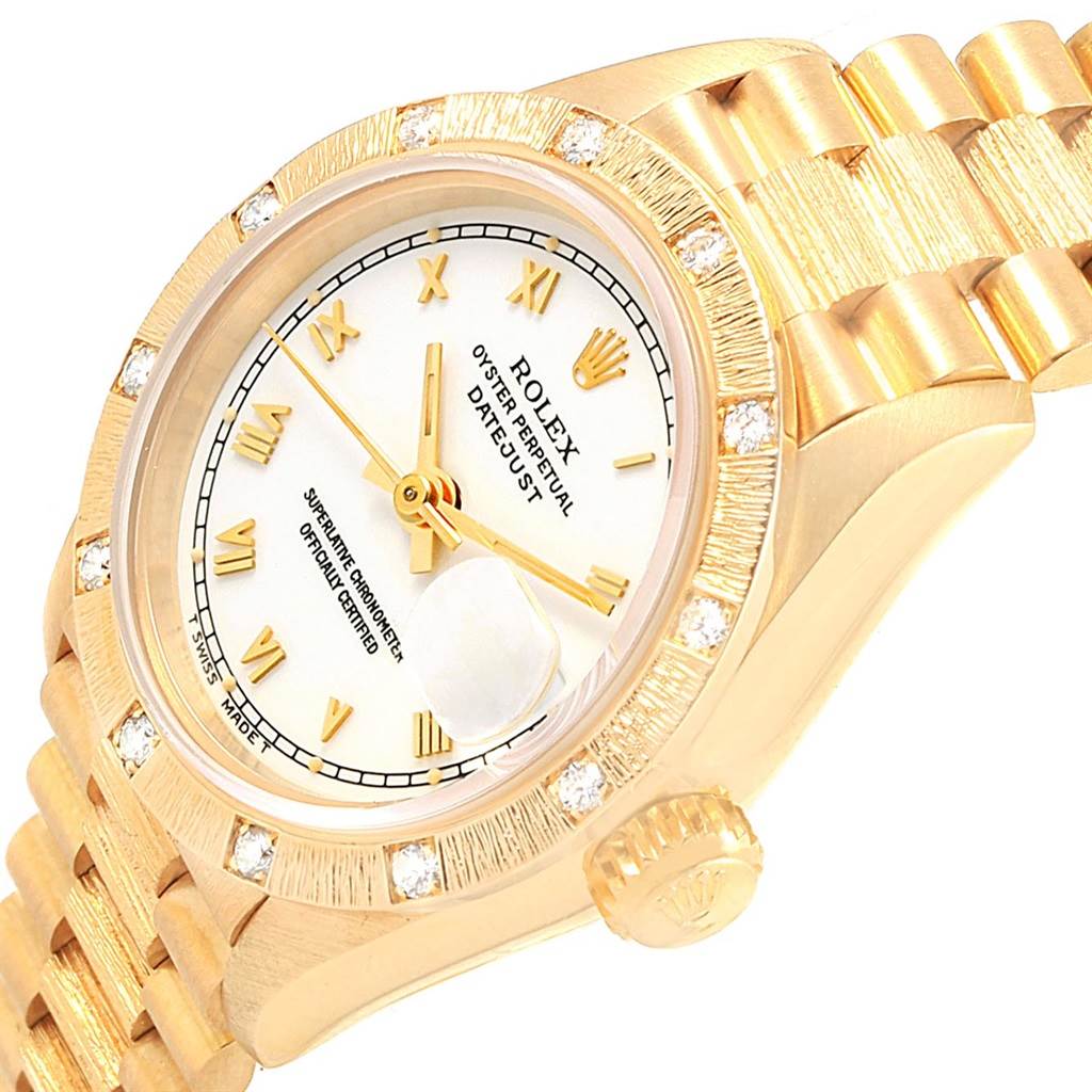 The image shows a close-up of a Rolex President 69288 Women
s Yellow Gold White Dial 69288 Women
s Yellow Gold White Dial model watch, focusing on the face, bezel, crown, and part of the band from a three-quarter angle.