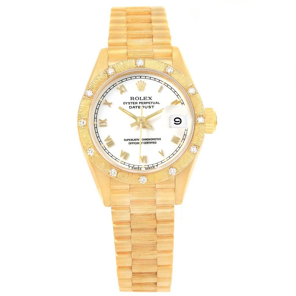 The image shows a front view of the Rolex President 69288 Women
s Yellow Gold White Dial 69288 Women
s Yellow Gold White Dial model watch, displaying its gold bracelet and diamond-studded bezel.